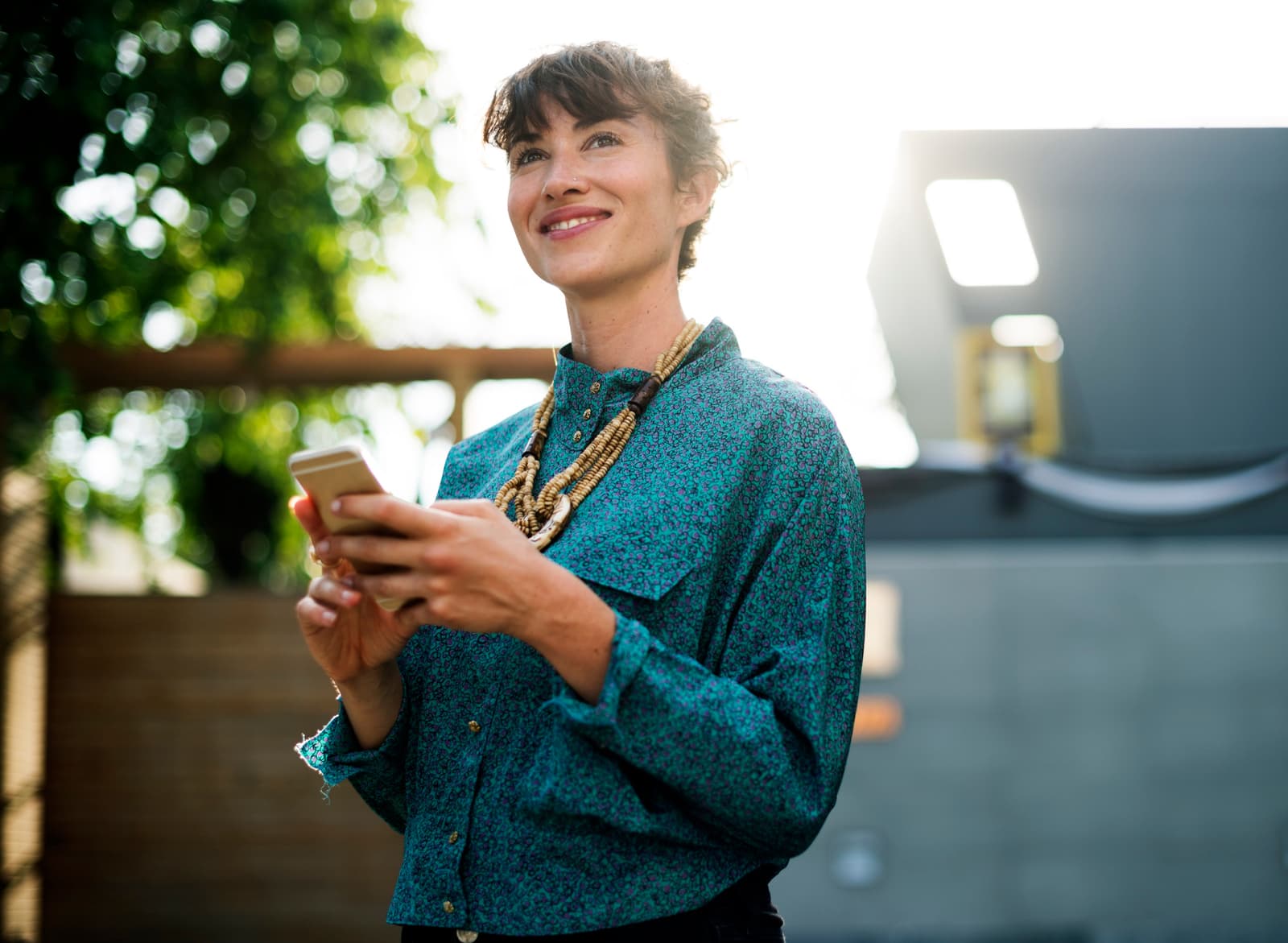 A brand manager checking social channels on a phone